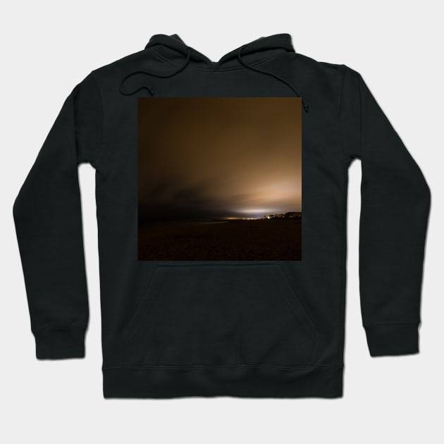 Beach of Carnon with an Illuminated Cloud Cover at Night Hoodie by holgermader